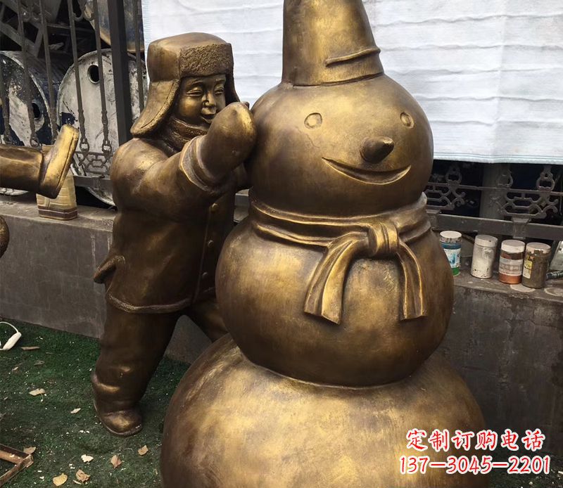 莆田戴帽子堆雪人的儿童铜雕