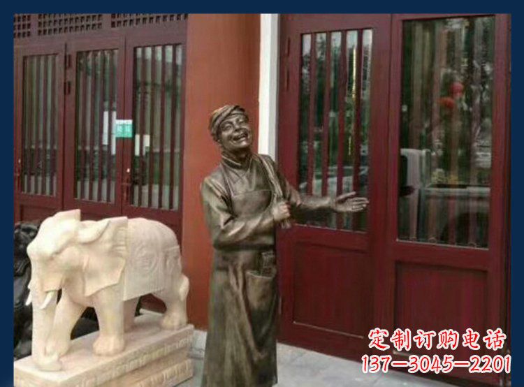 莆田铜雕店小二酒店迎宾人物雕塑